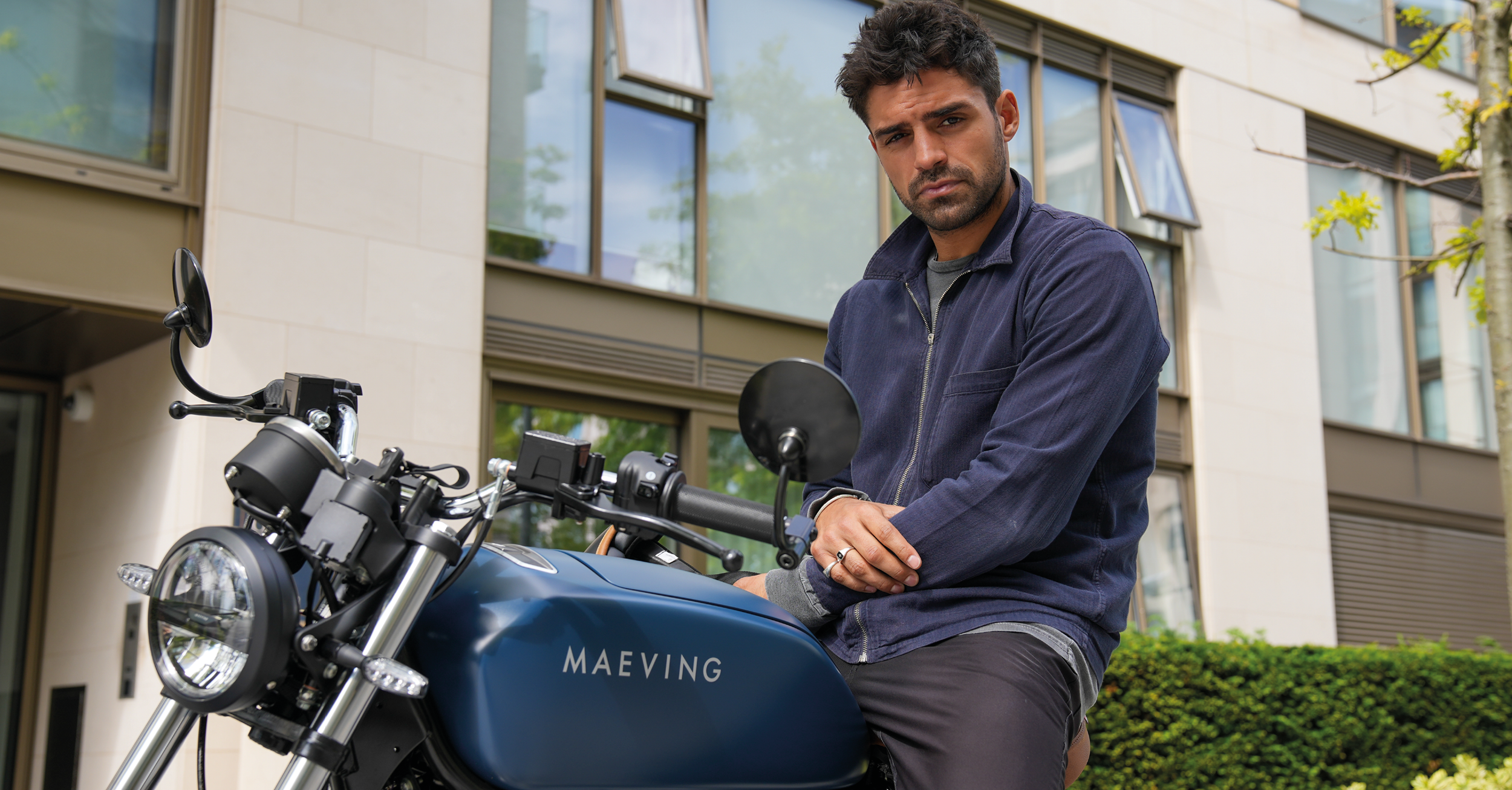 Actor Sean Teale, riding a Maeving electric motorbike
