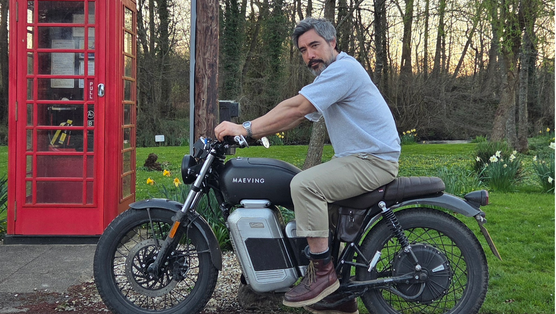 Black Maeving RM2 electric motorcycle with rider Steve Chusak