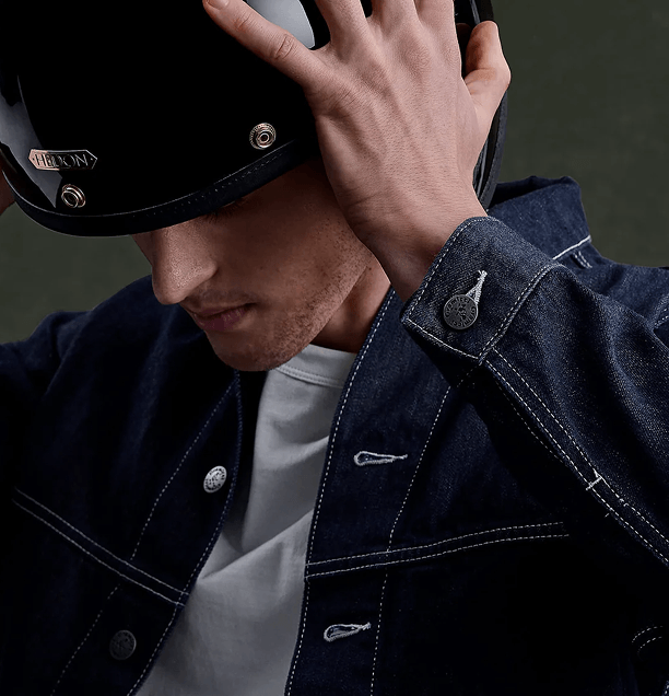 Maeving electric motorcycle rider with Hedon helmet